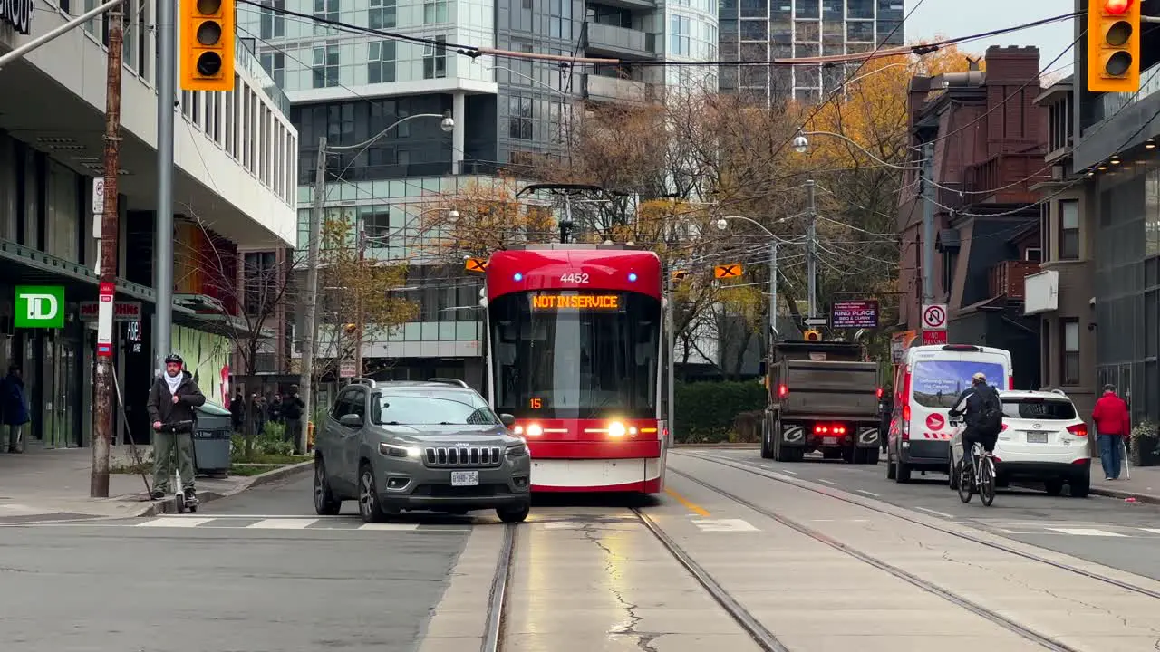 Red TTC Streetcar tram NOT IN SERVICE stopped in Toronto transportation delay