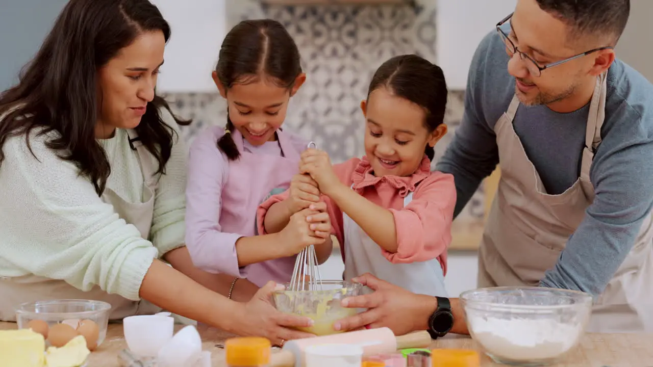 Kitchen stir and happy family children baking