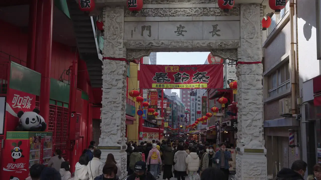 Entrance to Kobe Chinatown busy downtown streets in Kansai