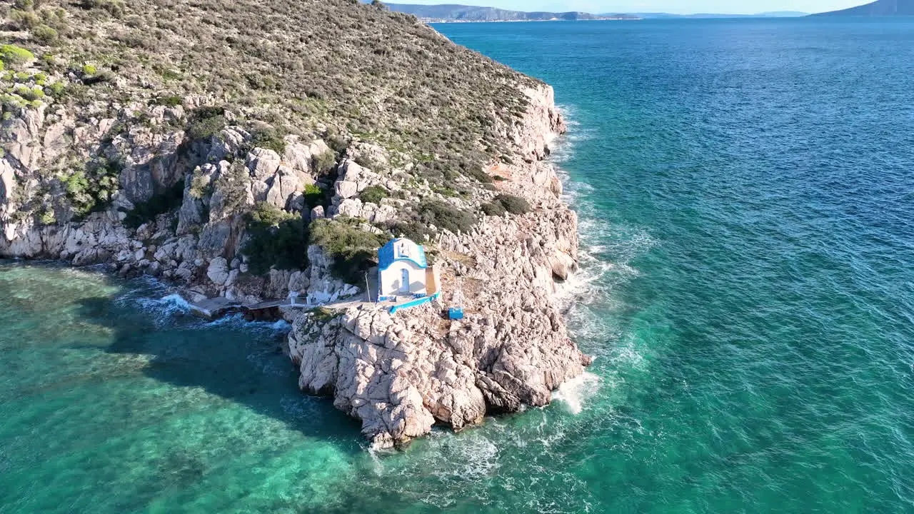 Flying around a small Greek Orthodox church on the rock next to the sea