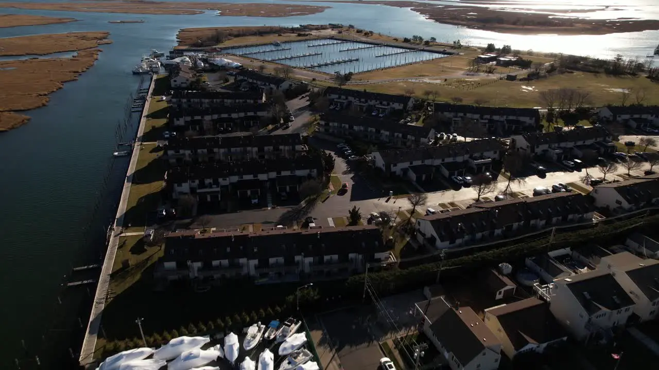 An aerial view over a residential neighborhood by the salt marshes in Freeport NY on a sunny day