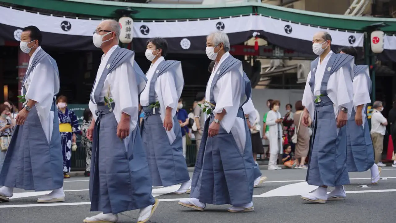 Gion Matsuri March Japanese Men in Traditional Costumes Walk Streets of Kyoto