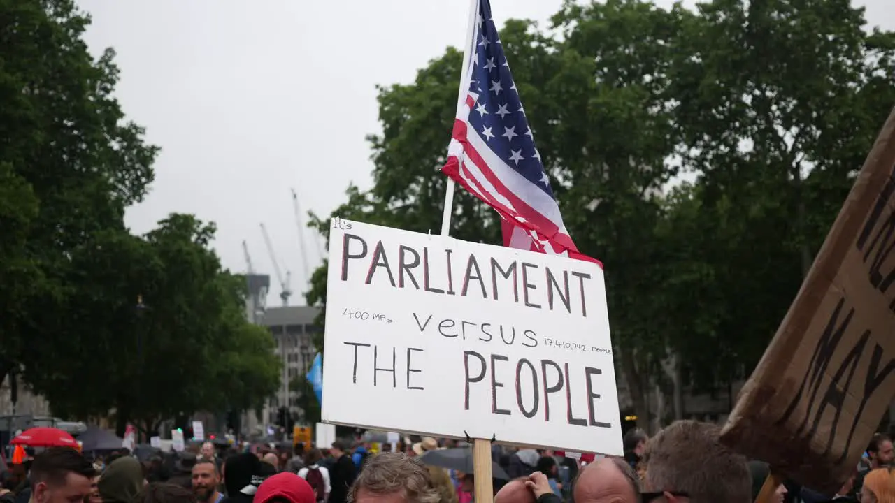 Protest signs at the Together against Trump protest march in central London during the Trump visit to the UK