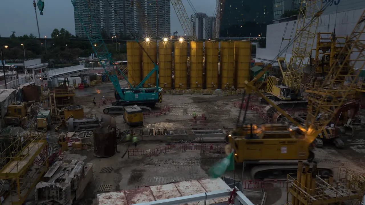 Timelapse of works on construction site in the evening