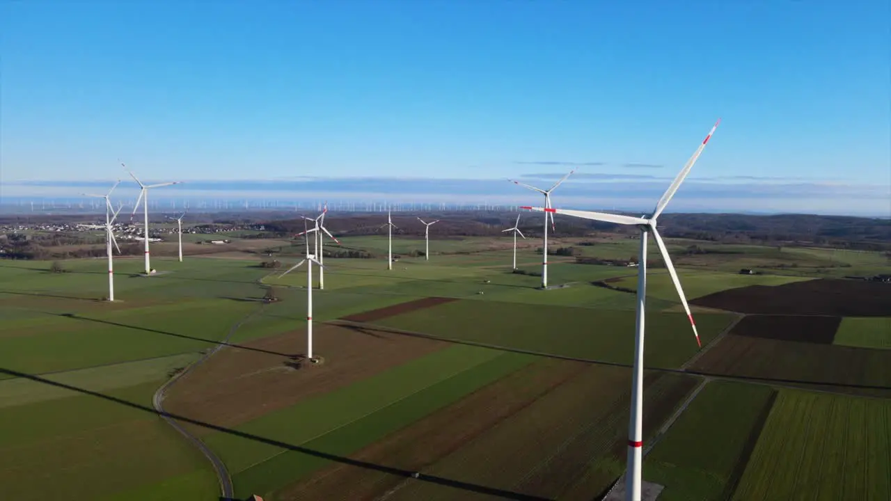 Harnessing the Power of the Wind Aerial View of Wind Turbines Generating Renewable Energy on a Sunny Day in Brilon Sauerland Germany