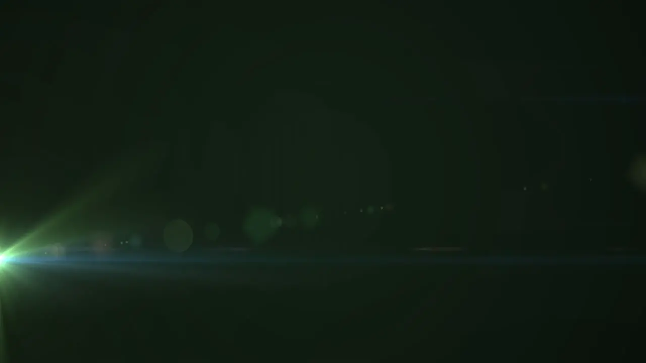 Animation of glowing green light moving on dark green background