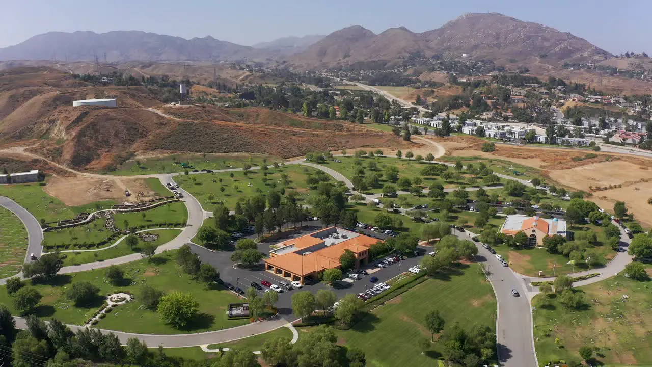 Aerial wide panning shot of a mortuary in California