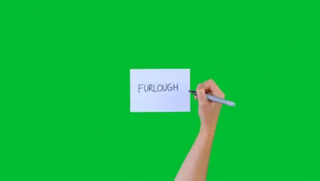 Woman Writing Furlough on Paper with Green Screen