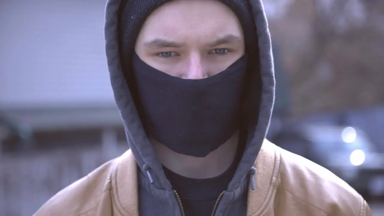 Young Caucasian Man Wearing A Fabric Facemask