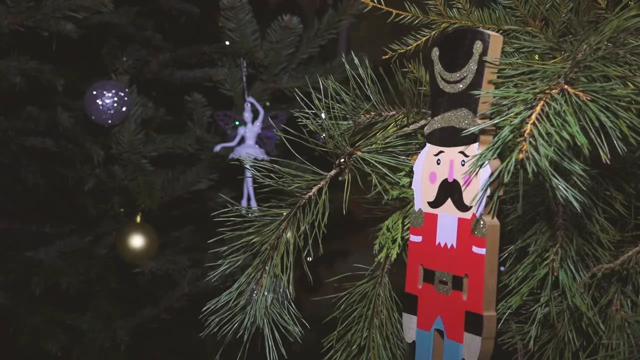 Nutcrackers hanging on Christmas tree