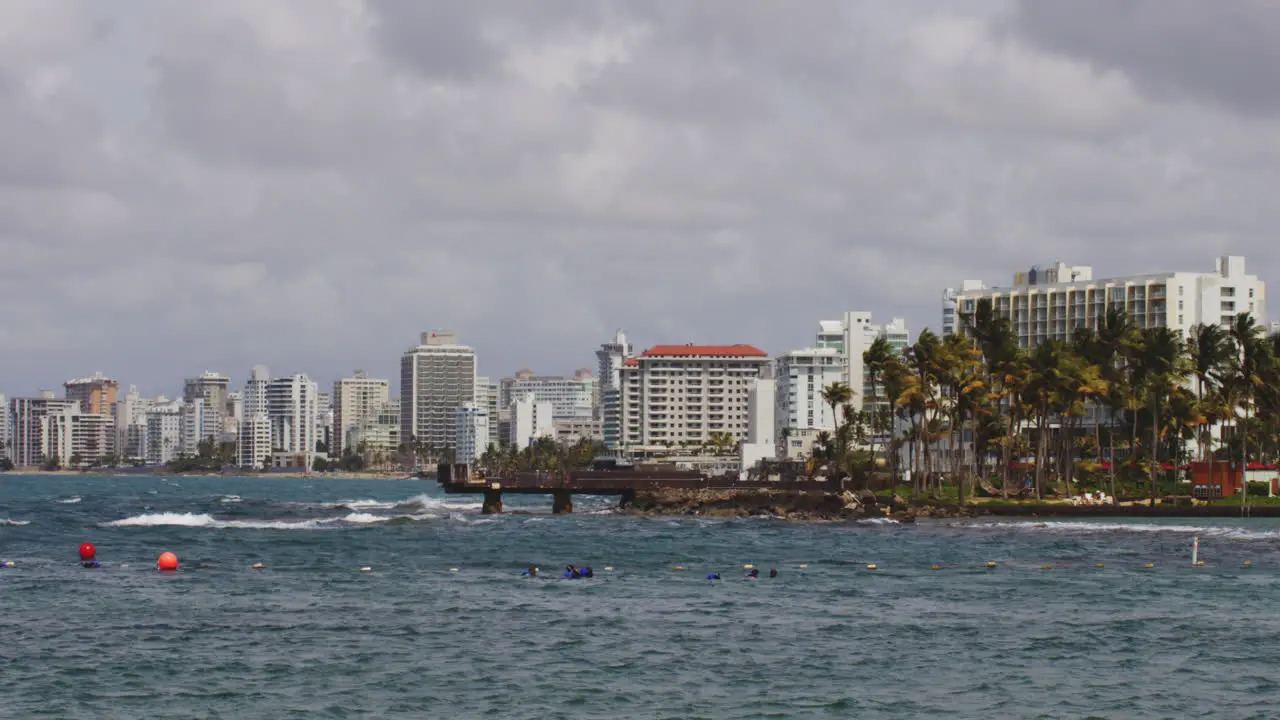 Holiday apartment buildings of Condando Beach view across El Boqueron Bay San Juan Puerto Rico