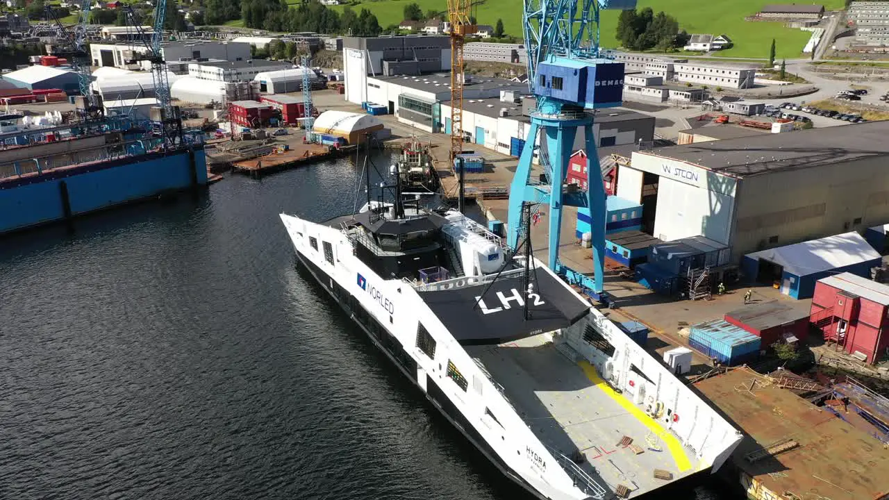 Worlds first hydrogen powered ferry Hydra at Westcon yards for Hydrogen equipment installation White liquid hydrogen tank installed beside wheelhouse Aerial Olensvag Norway