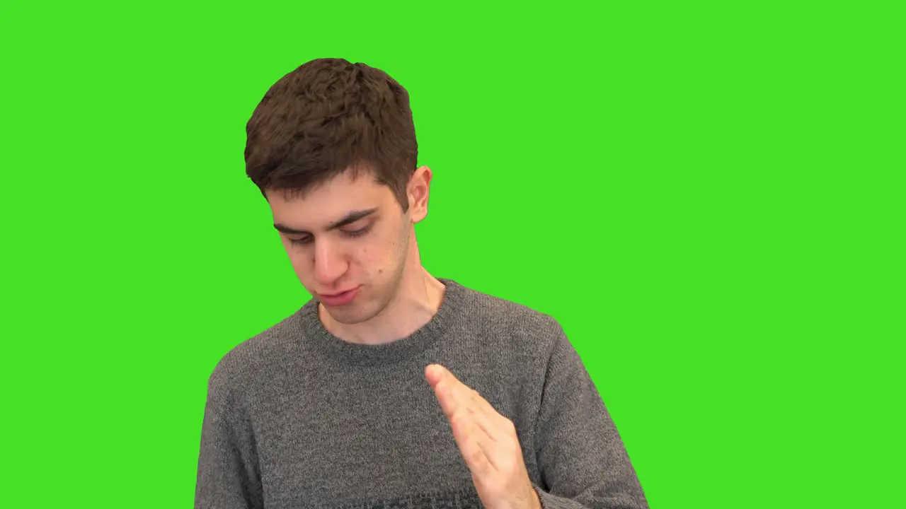 Green screen of young adult acting and doing robot movements