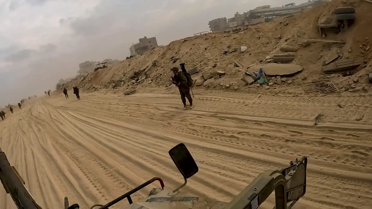 Looking down the barrel mounted gun on IDF Hummer as troops advance in Gaza