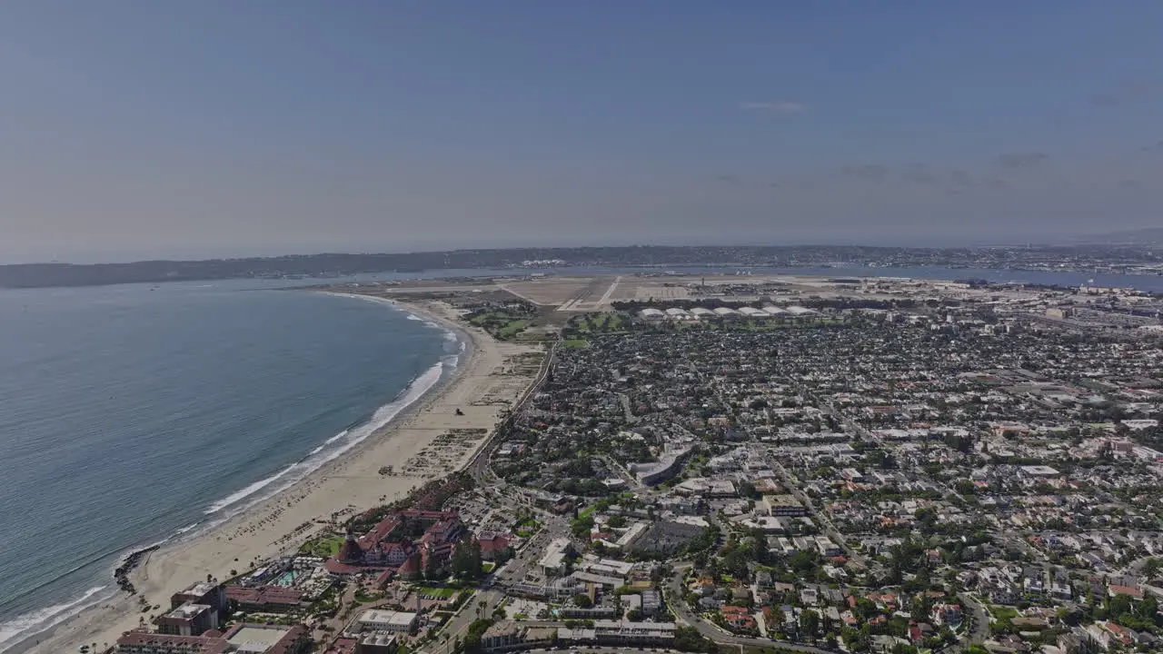 San Diego California Aerial v61 flyover peninsula coronado resort city panoramic panning view capturing naval air base and downtown cityscape across the bay Shot with Mavic 3 Cine September 2022