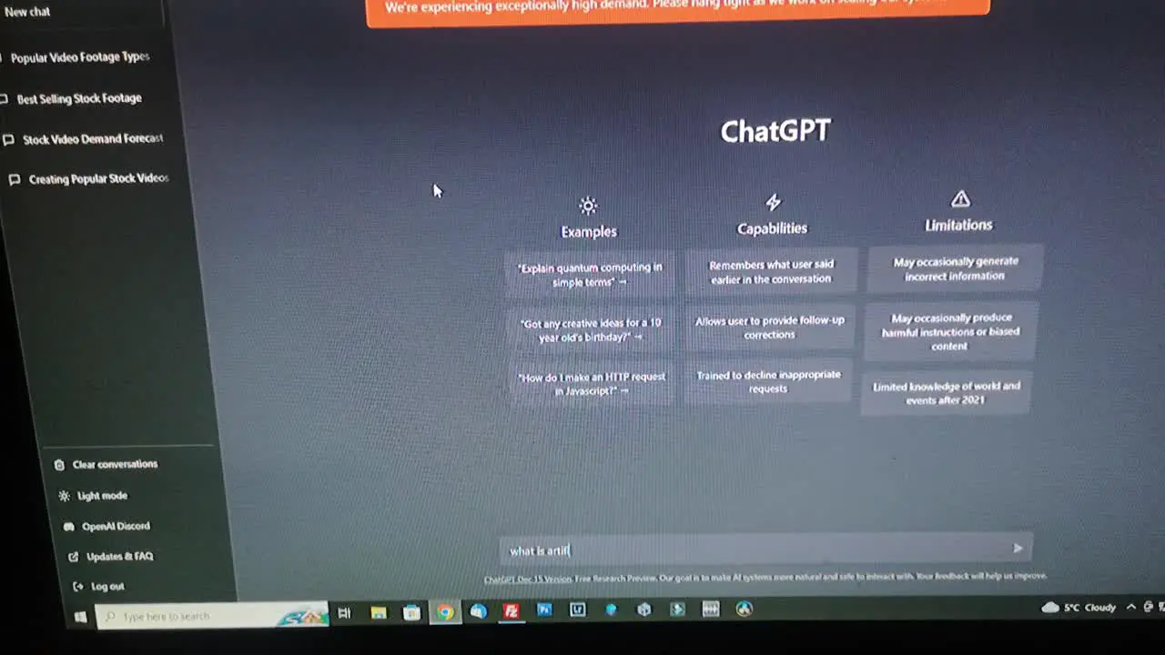 Human interaction with ChatGPT artificial intelligence conversation on computer laptop screen