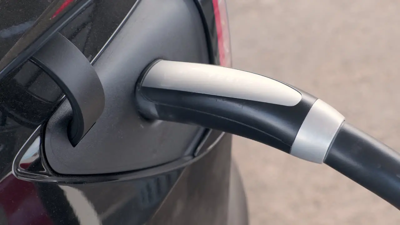 Tesla Model 3 Charging At Supercharger Station