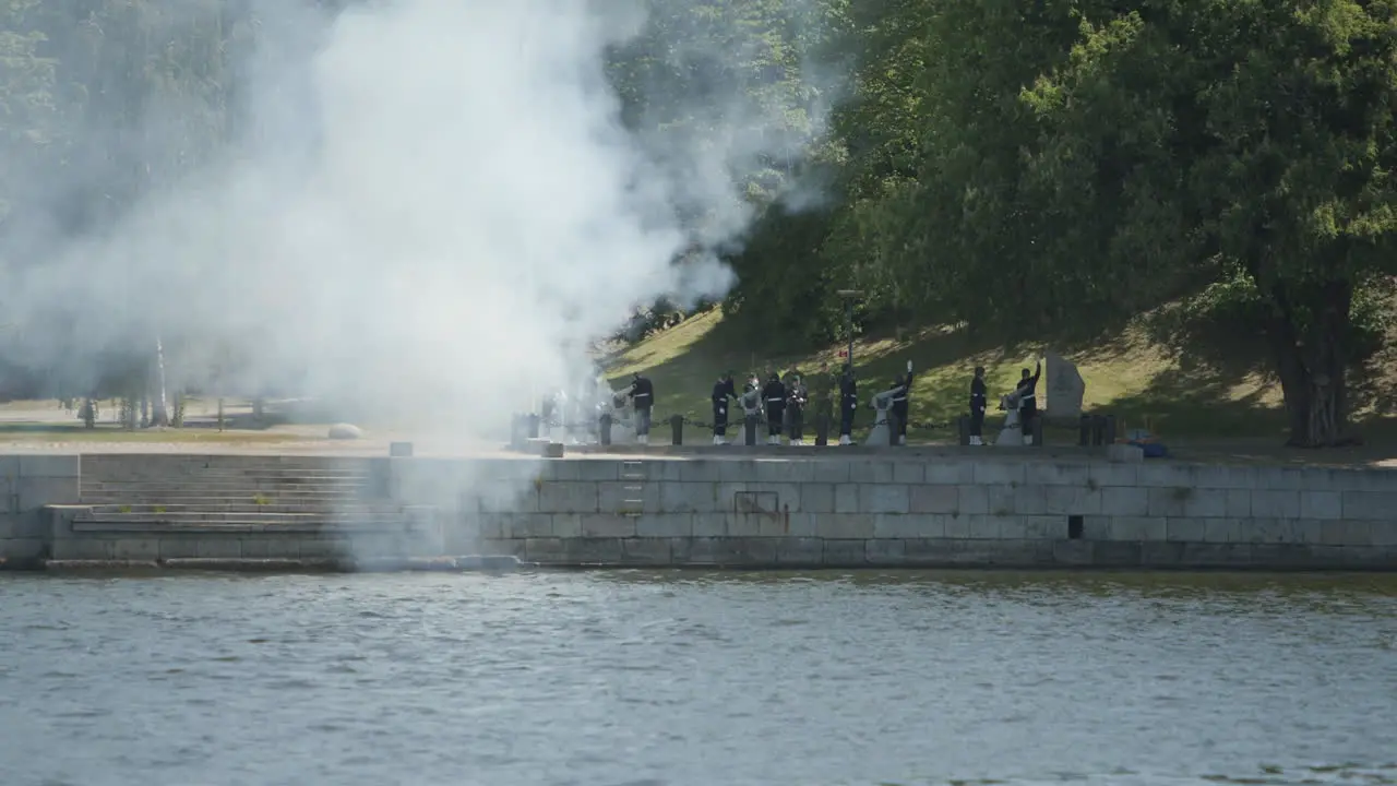 Armed guards shoot salute on National Day in Stockholm Sweden