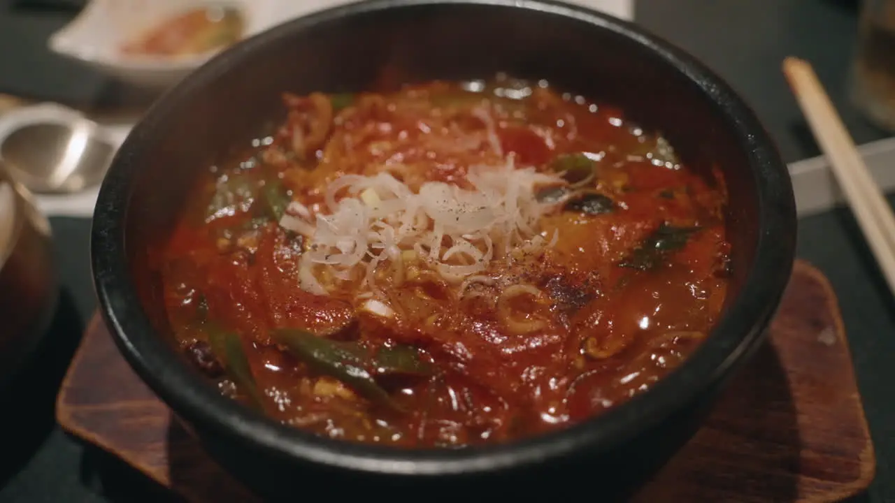 Sizzling Bowl Of Hot Korean Yukgaejang In A Restaurant In Tokyo close up