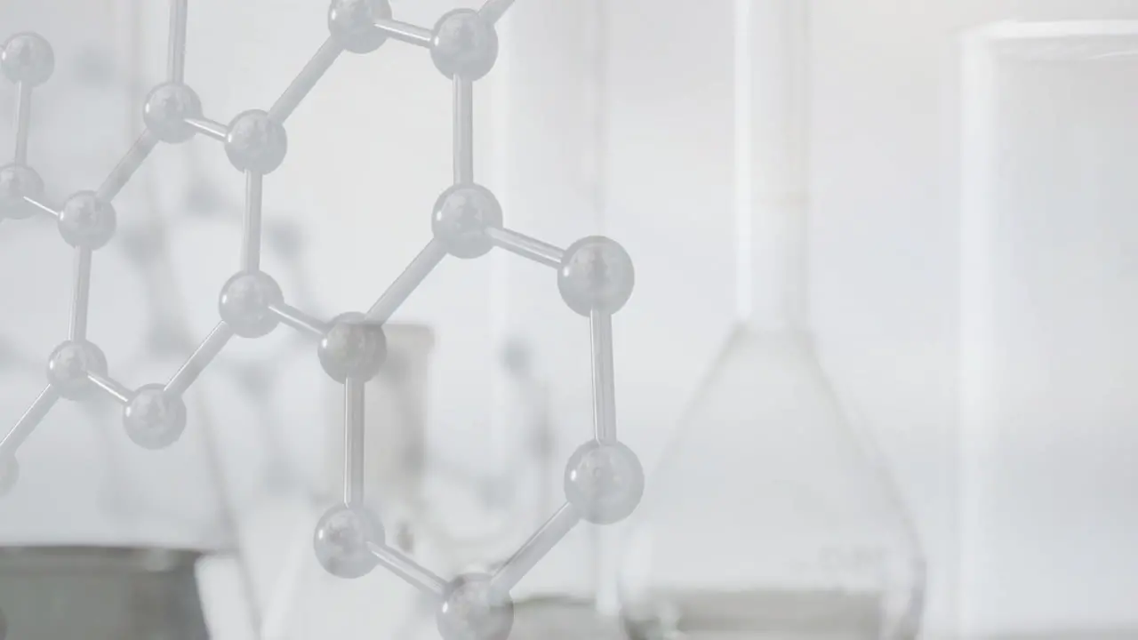 Animation of chemical structures over laboratory dishes on white background