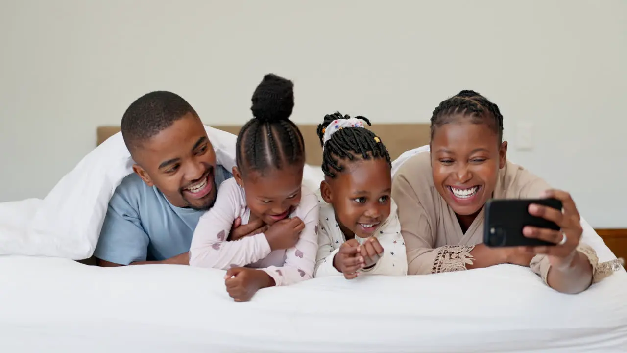 Black family selfie and parents with children