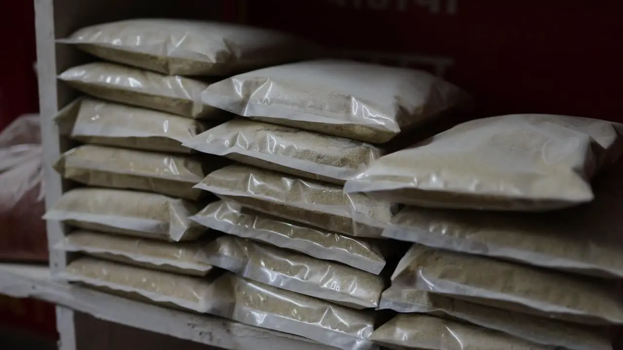 coriander seeds powder spice for sale at retail shop from top angle at day