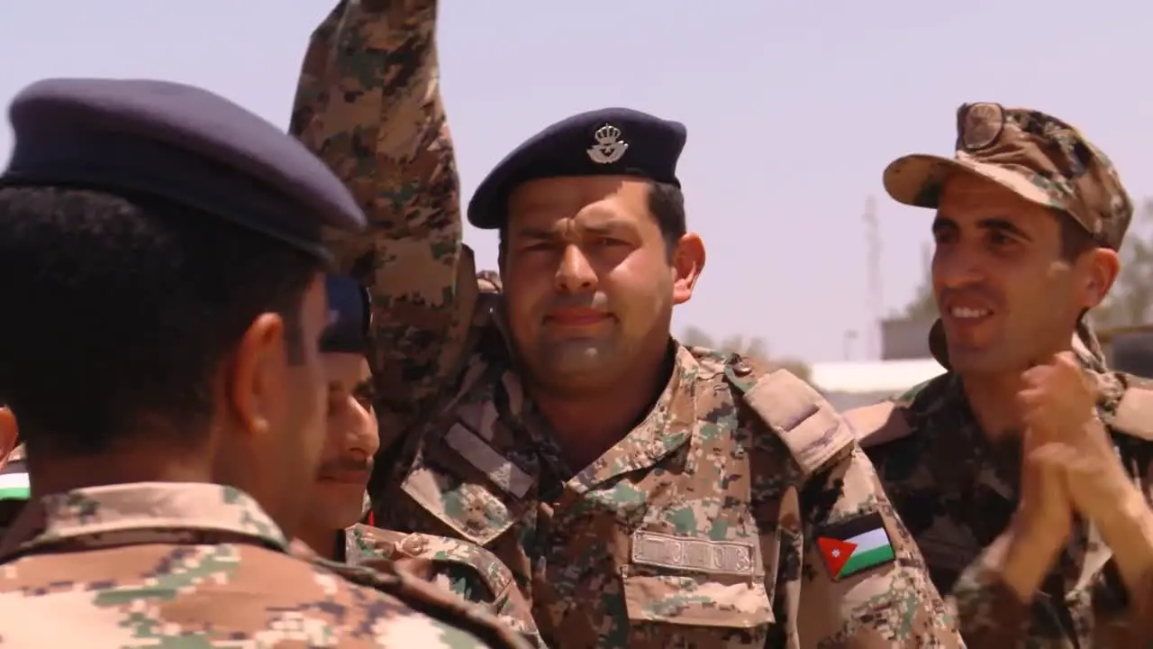 Crowds Of Jordanian Air Force Military Personnel Cheer For The Camera 5