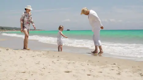 Grandma Mom and Girl on Summer Beach Holiday