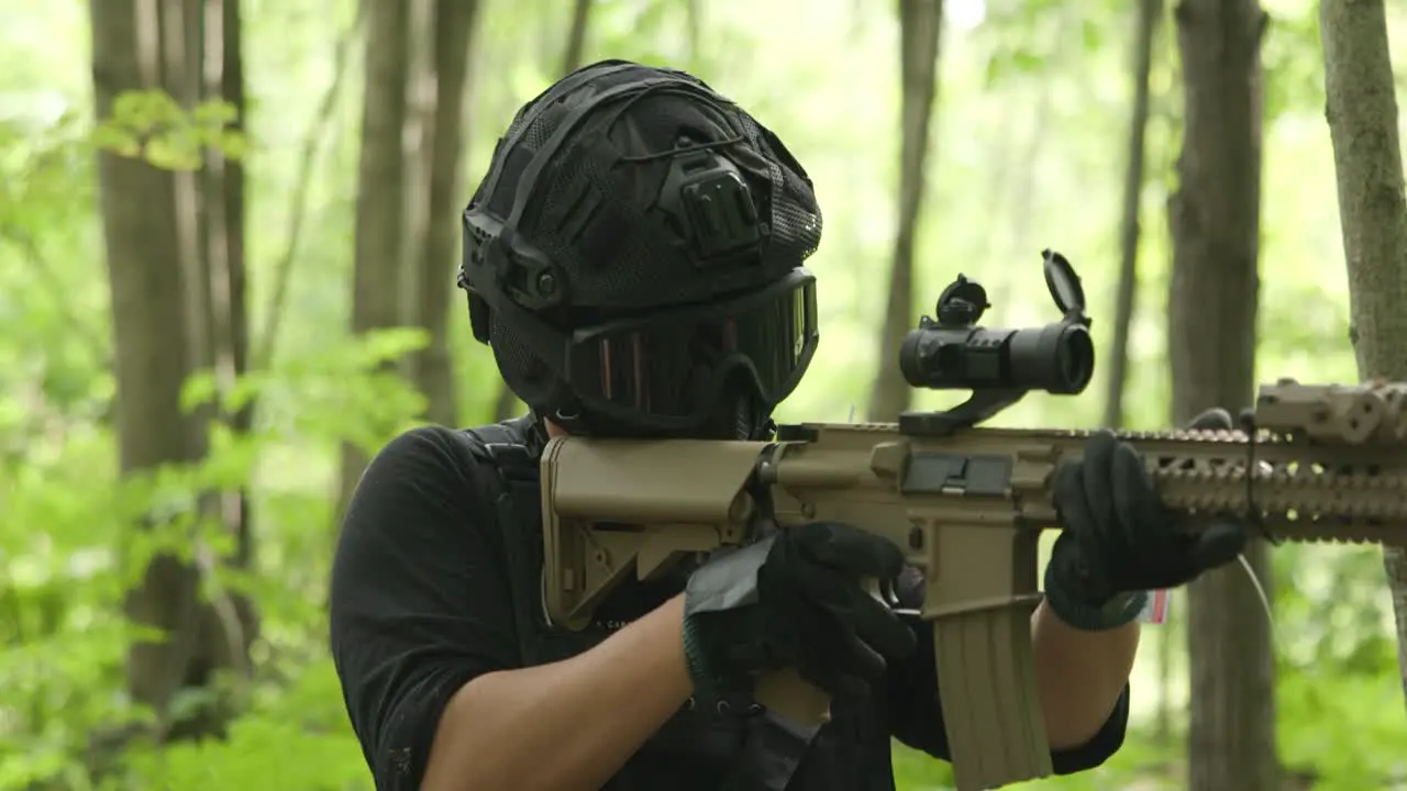 Tactical army guy switches from rifle to pistol