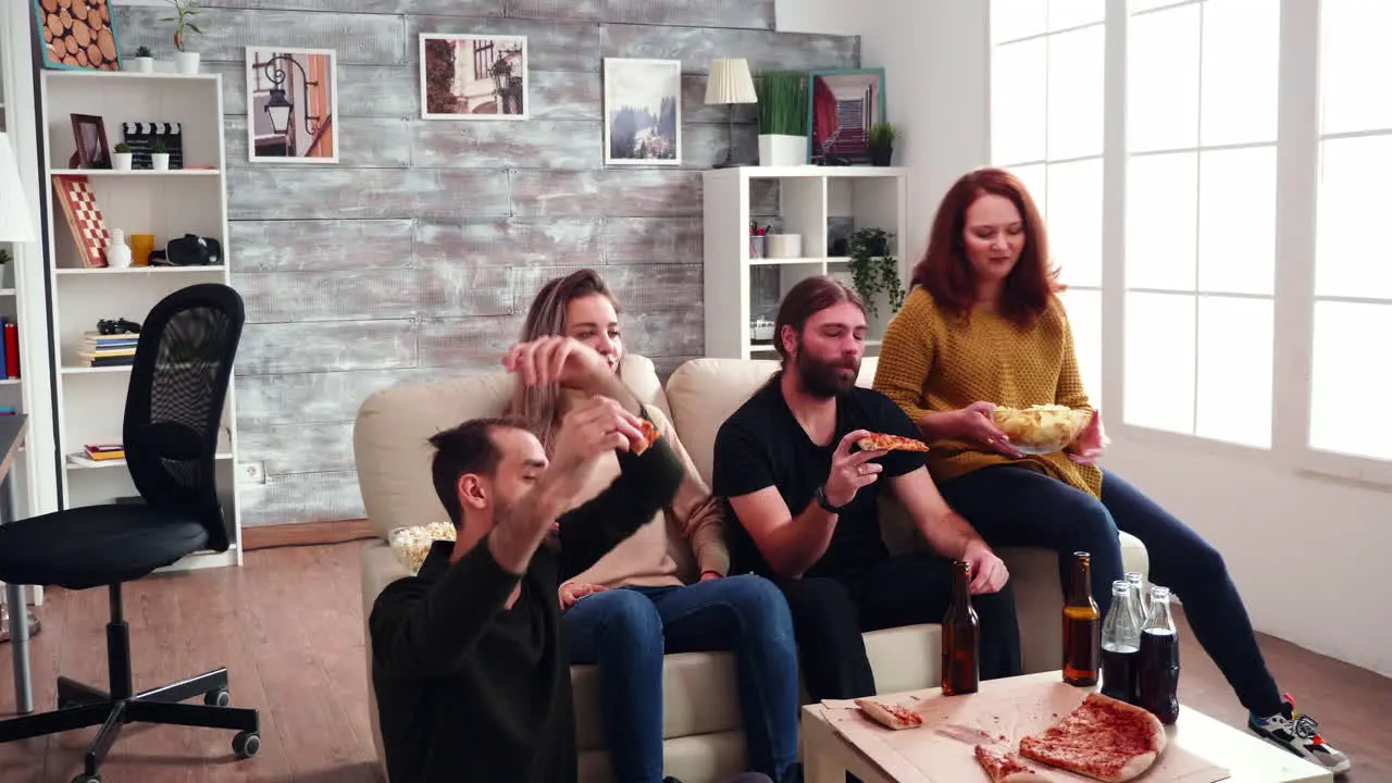 Diverse group of friends having an argument after their favorite football team