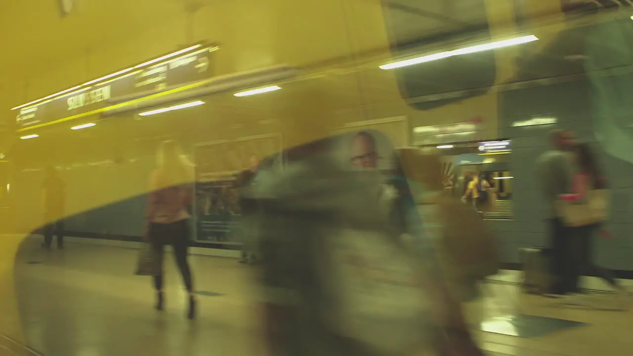 Camera films inside a subway car as it leaves Slussen subway station in Stockholm City