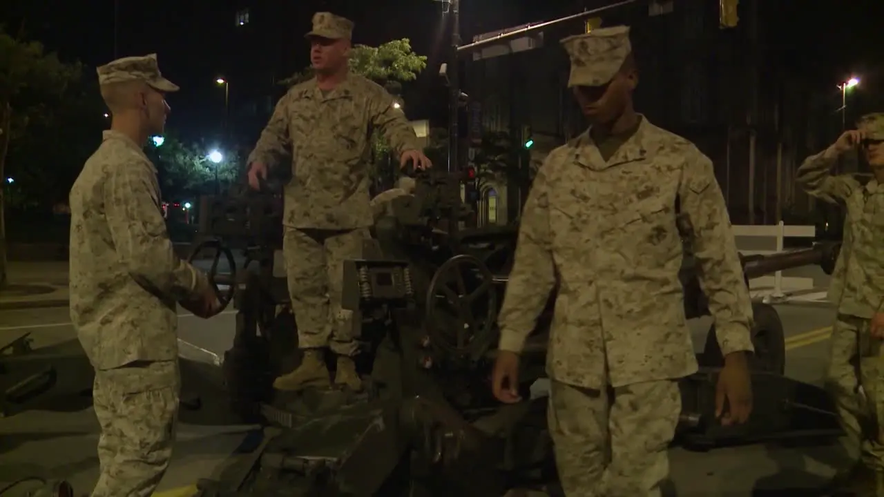 Police And Marines Roll Artillery In An American City During Times Of Public Unrest And Rioting