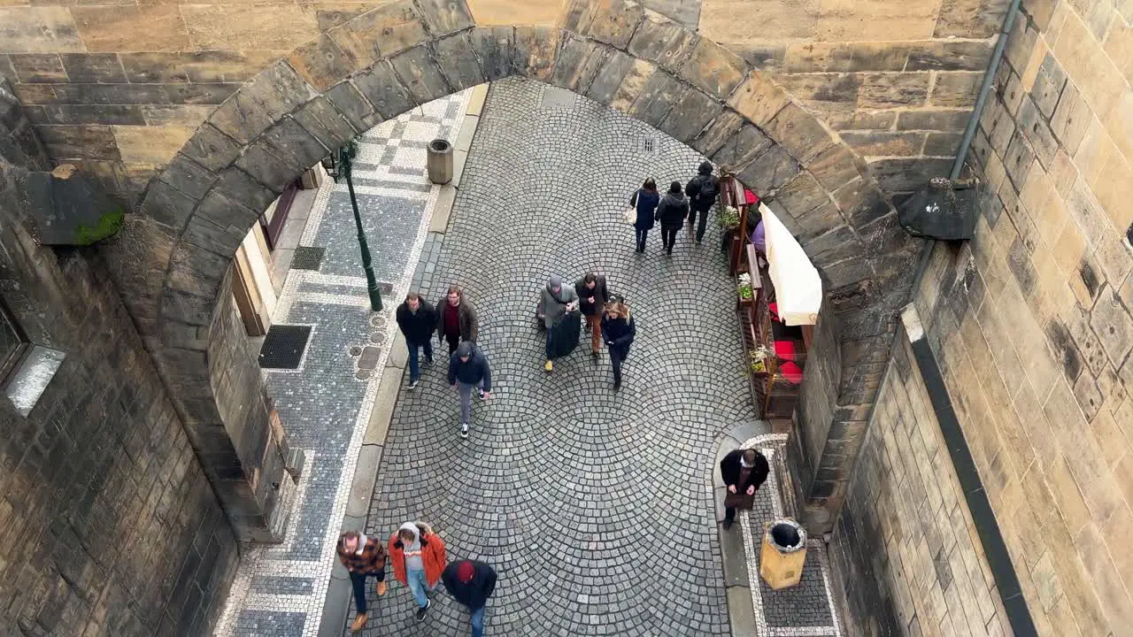 Charles Bridge from above during the day in the winter with people moving 4K 30 FPS