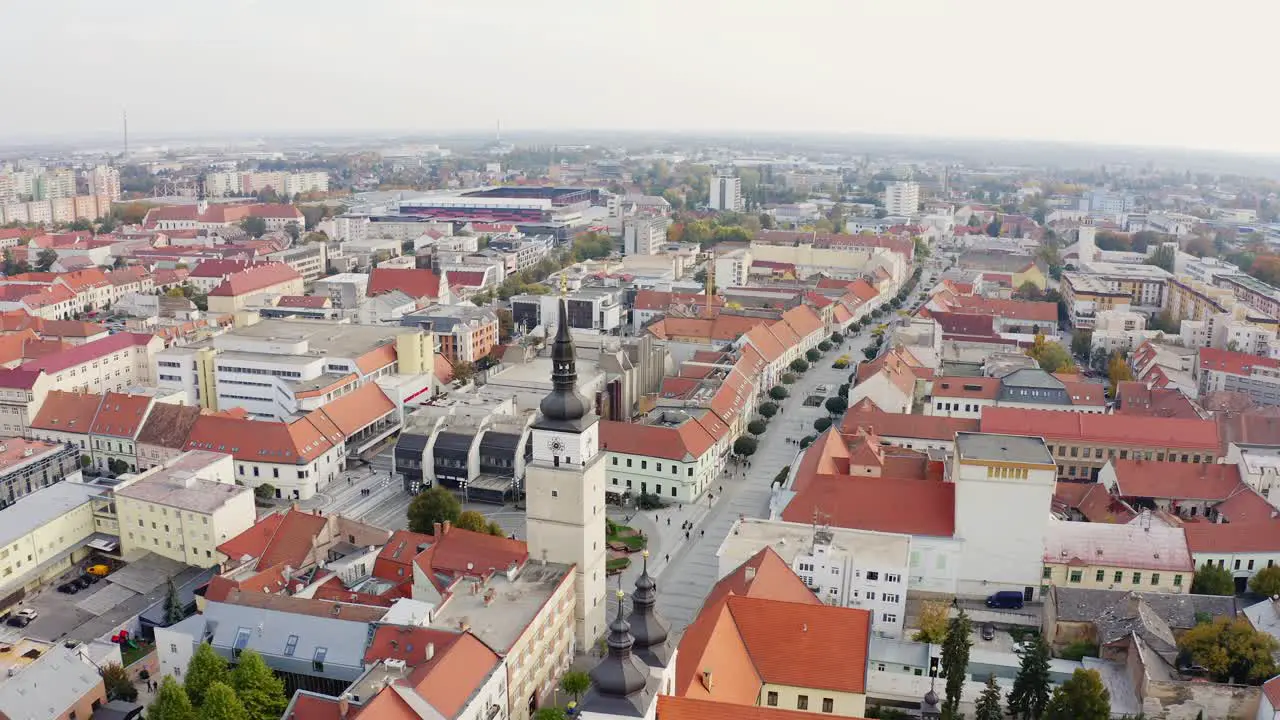 Aerial wide angle clip of Trnava City with City Tower 