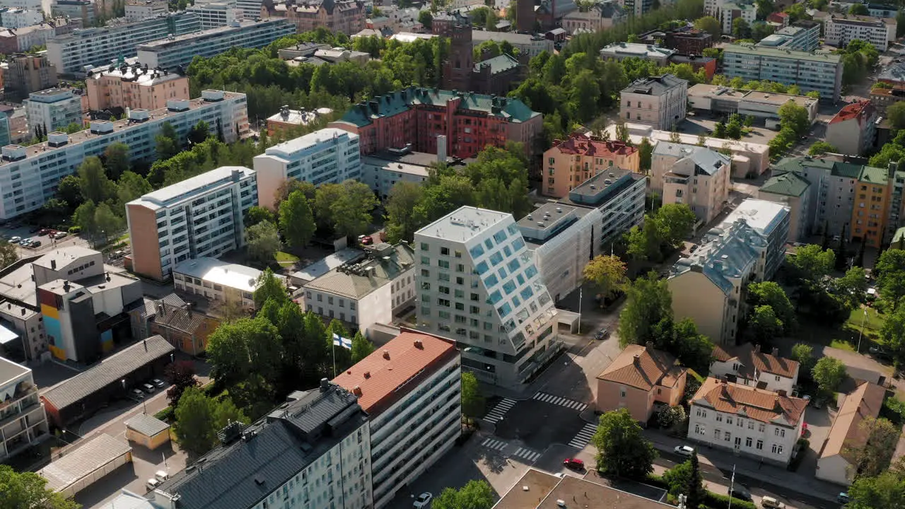 Wide aerial orbit shot of Typical European City Architecture with a mix of old and modern buildings in Northern Europe