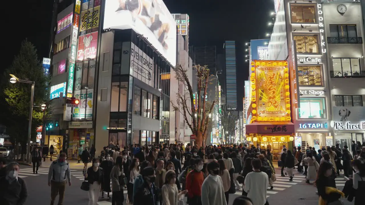 In Downtown Shinjuku Japan People Cross Street Towards Kabukicho