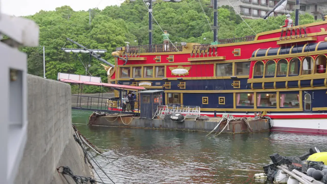 Extravagant Sightseeing Ship in Ago Bay as tourists board