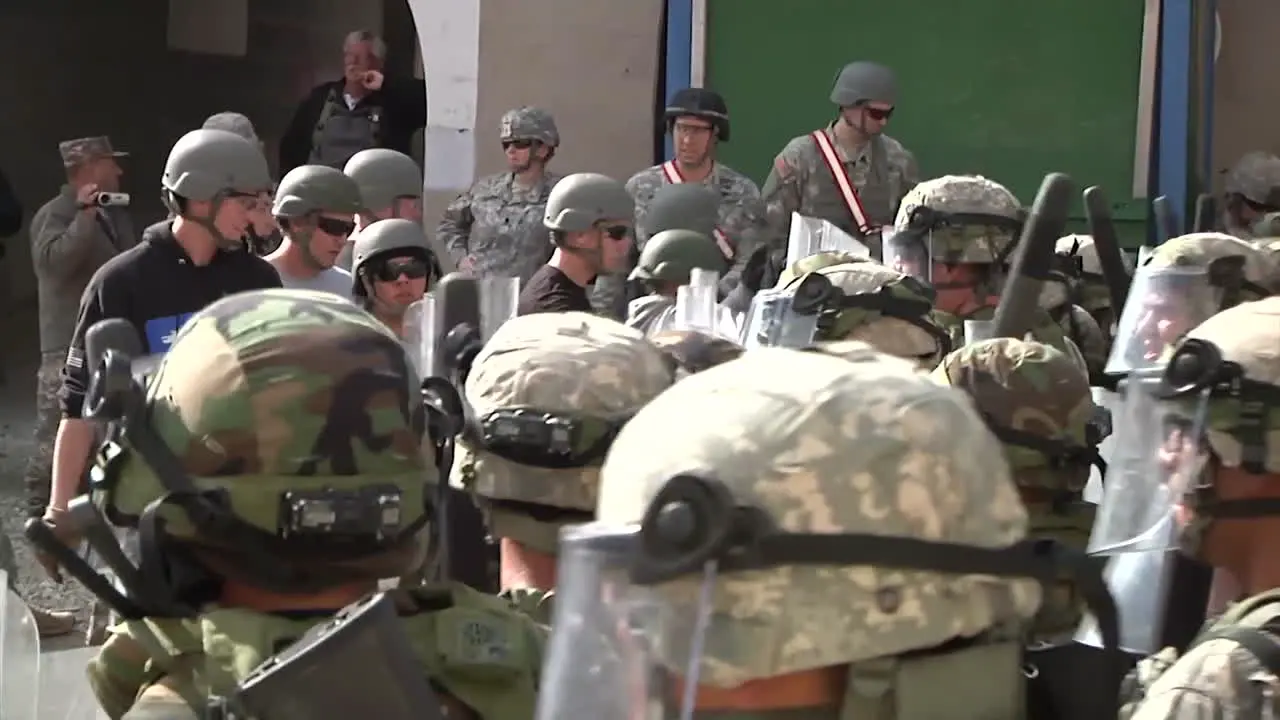 Rioters And Protesters Meet Police Troops And Tear Gas During A Mock Demonstration 3