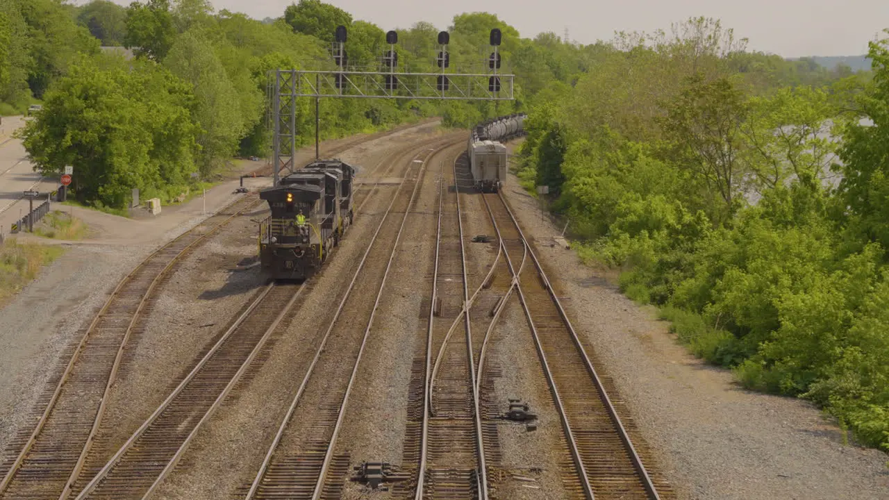 train engine backing up on the deserted train intersection