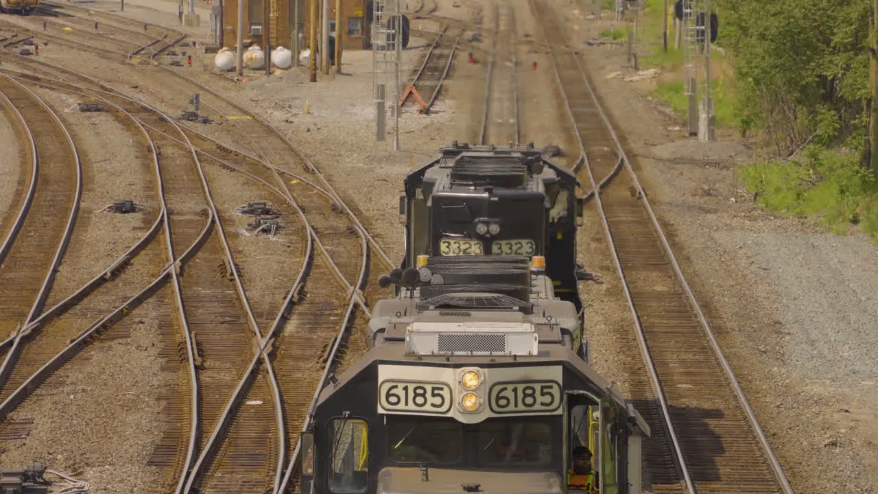 overhead view of a train engine as it slowly proceeds down the railroad tracks in Pennsylvania