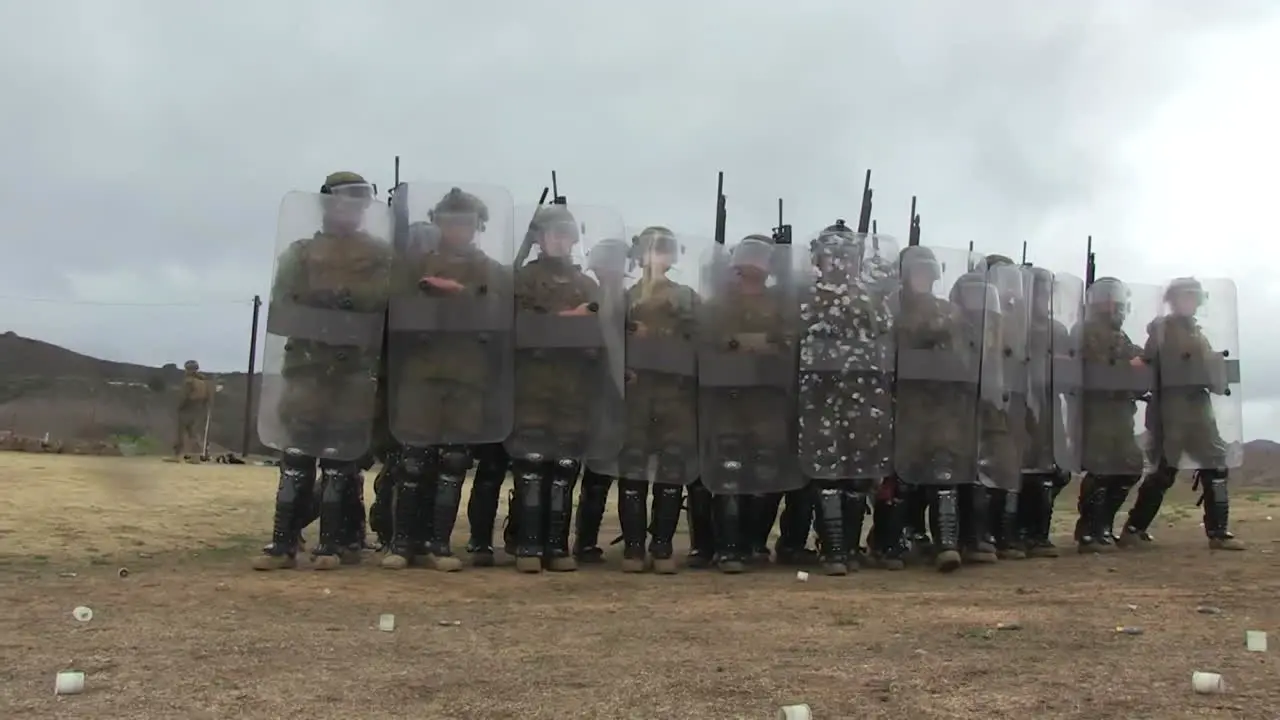 Troops Practice A Defensive Formation Against Rioters 2