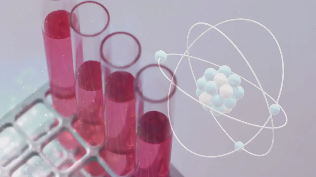 Animation of atom over laboratory test tubes on grey background