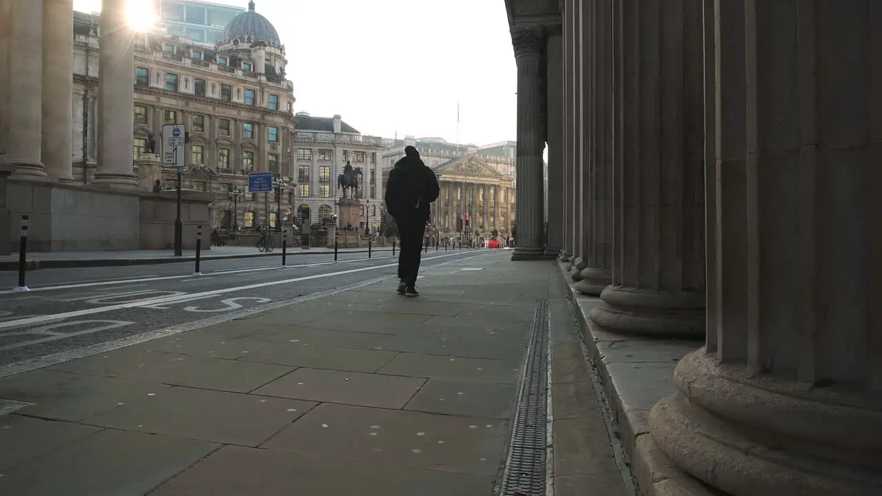 Empty roads and quiet streets with almost no people and no traffic during the Coronavirus pandemic Covid-19 lockdown taken at rush hour at Bank in the City of London England Europe