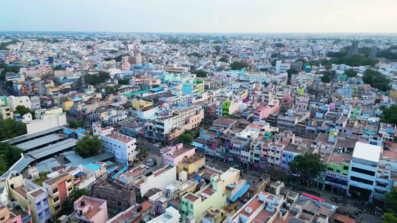 Densely packed colorful buildings in the Indian ancient city of Madurai in an urban area daytime aerial view