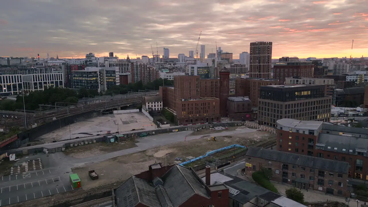 Rising Establishing Aerial Drone Shot Over Outskirts of Leeds City Centre at Sunrise