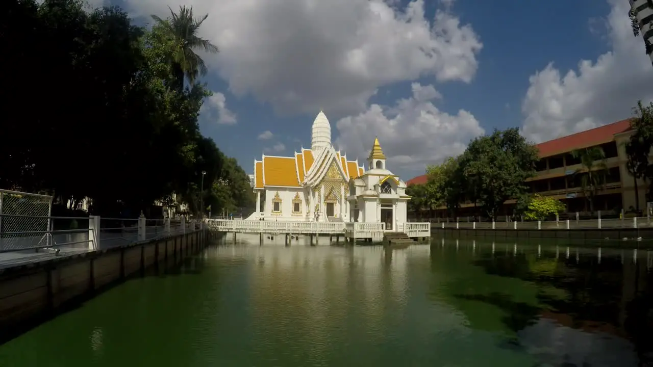 The clouds moving quickly above a Temple in Pattaya Thailand