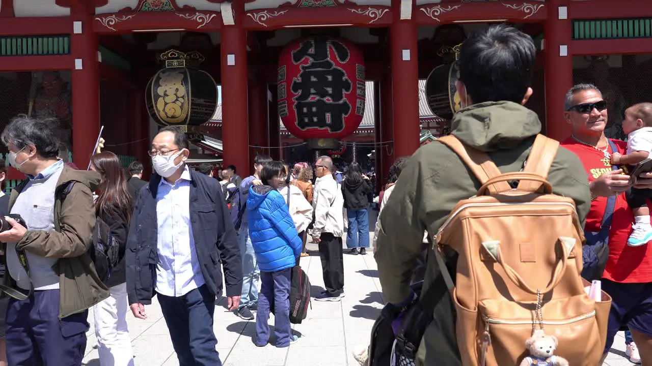 TOKYO JAPAN APRIL 9 2023 People walking in Senso-ji temple in Asakusa