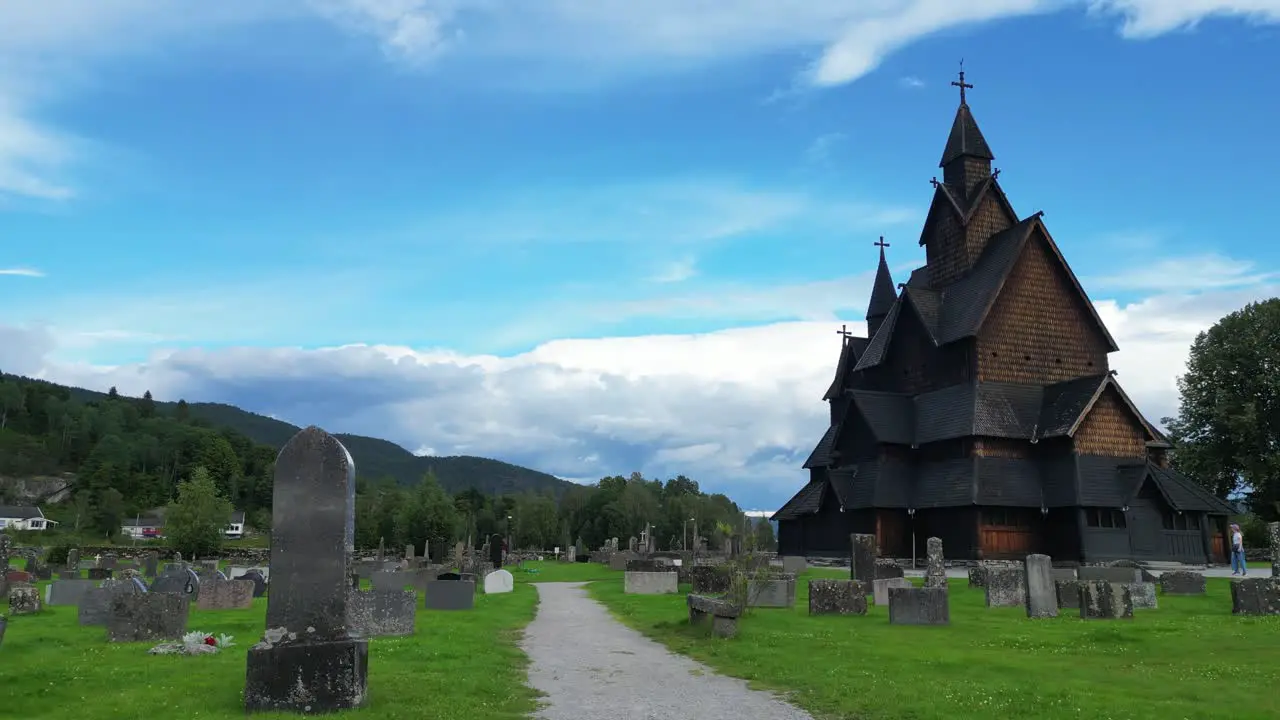 Heddal Stave Church and Grave Headstones in Vestfold og Telemark Norway Scandinavia Pan