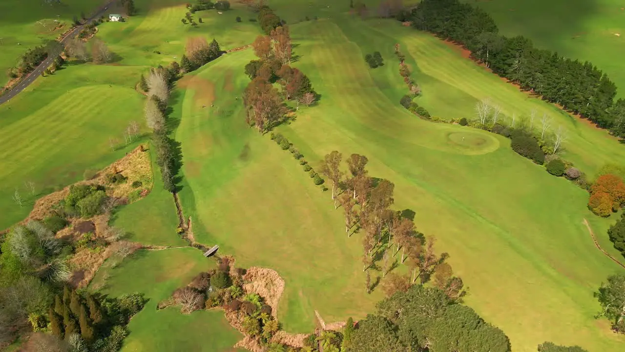 Cinematic flight over New Zealand golf course in the Coromandel