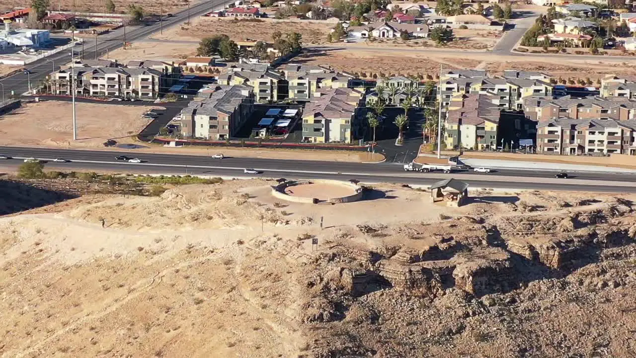 drone circling hill in town